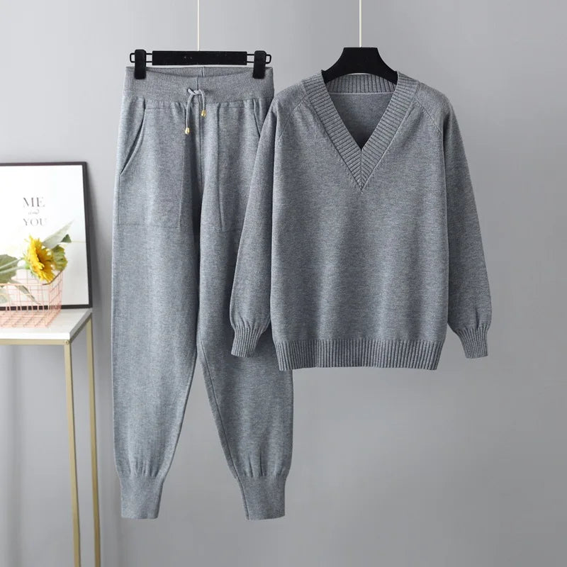Women's beige two-piece casual set with coordinated top and pants, figure-flattering relaxed silhouette