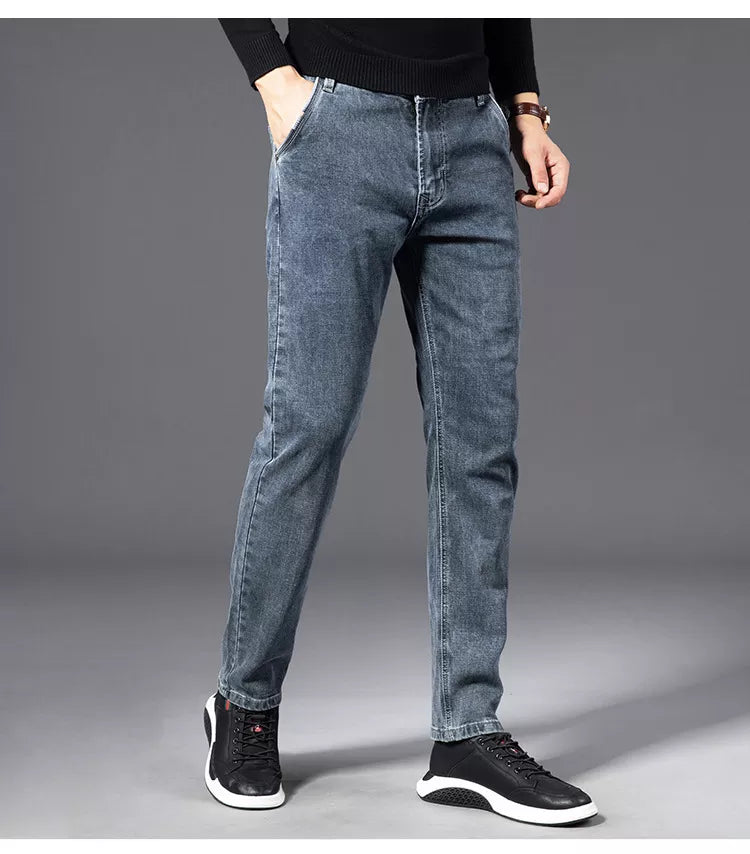 Men's slim fit stretch denim jeans in classic blue, tailored silhouette with all-day flex comfort