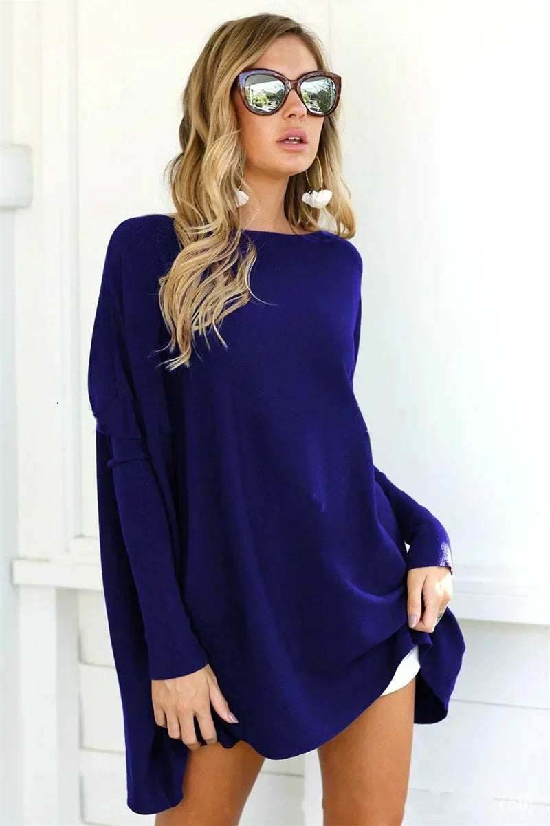 Women's oversized tunic-length knit pullover sweater in cozy soft fabric, perfect for layering