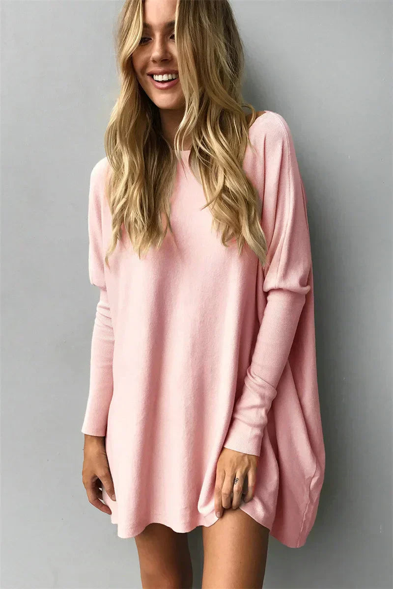 Women's oversized tunic-length pullover sweater in soft cozy knit, relaxed fit perfect for layering