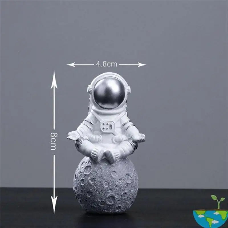 Astrocom astronaut resin figurine with realistic suit helmet and gear detail for space fans