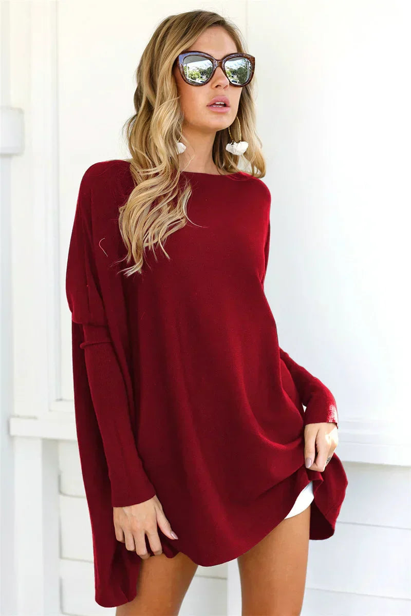 Women's oversized tunic-length knit pullover sweater in cozy soft fabric, relaxed fit for layering