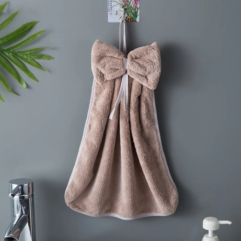 Coral velvet microfiber towel with bow charm accent, ultra-soft quick-dry design for kitchen and bath