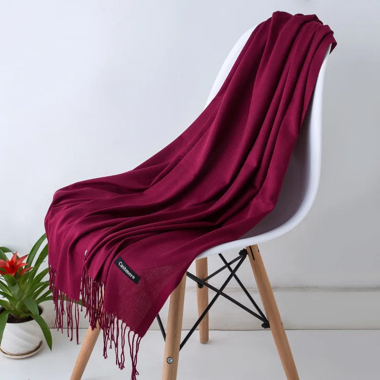 Women's luxurious soft scarf in premium neutral tones, versatile wrap style with timeless elegant design