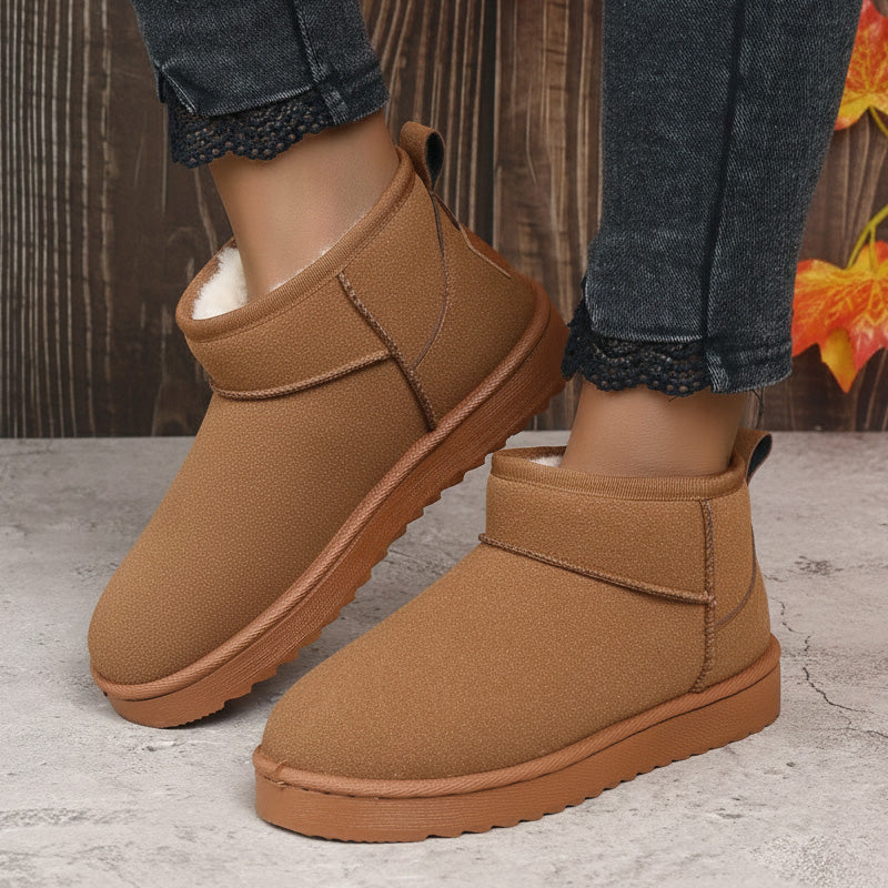 Women's ultra mini suede ankle booties with plush faux fur lining and arch support in neutral tone