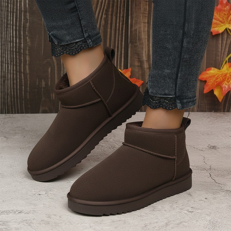 Women's ultra mini suede ankle booties with plush faux fur lining and arch support in neutral tone