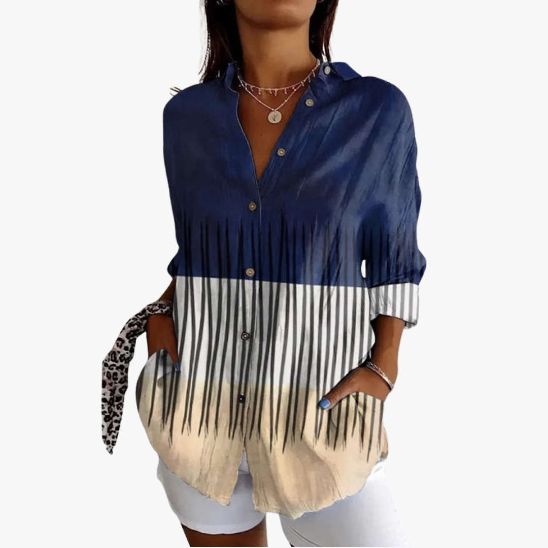 Women's white linen blouse with handcrafted embroidery, relaxed elegant fit for timeless artisan style