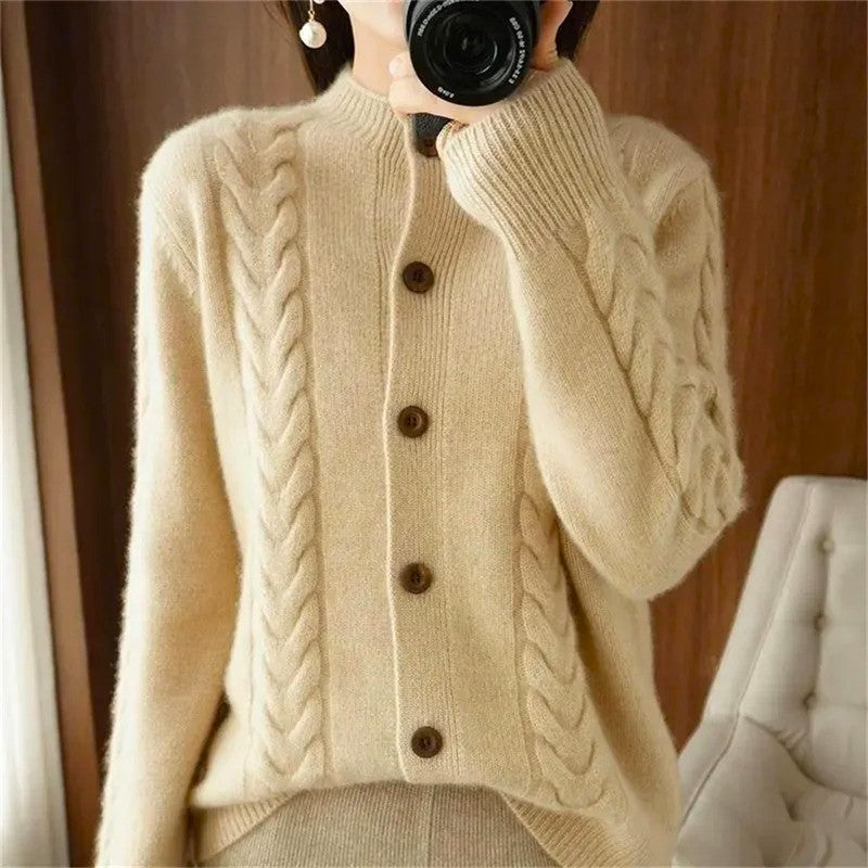 Women's cream cable knit button-front cardigan with intricate texture, classic fit for versatile layering