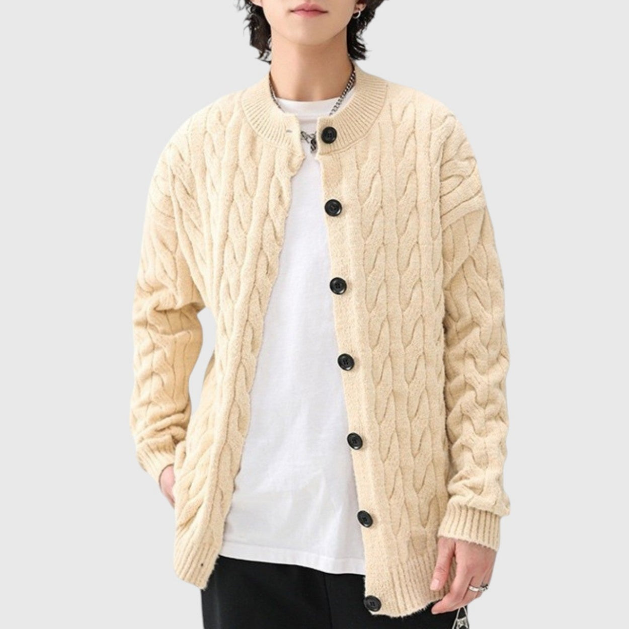 Women's relaxed cable knit cardigan in soft cotton blend with rustic texture and front button closure