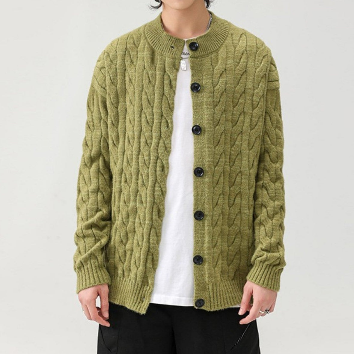 Women's relaxed cable knit cardigan in soft cotton blend with rustic texture and front button closure