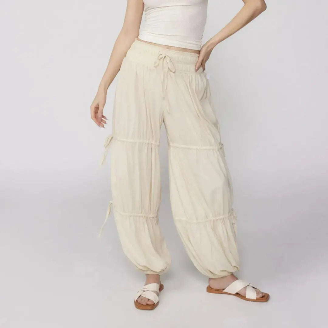Boho tiered wide-leg lounge pants with drawstring high waist, relaxed fit, flowing gathered panels