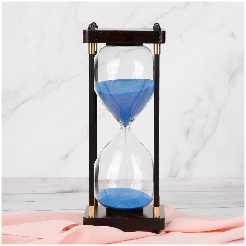 Minimalist glass and wood hourglass timer 60-minute copper accents desk essential focused work