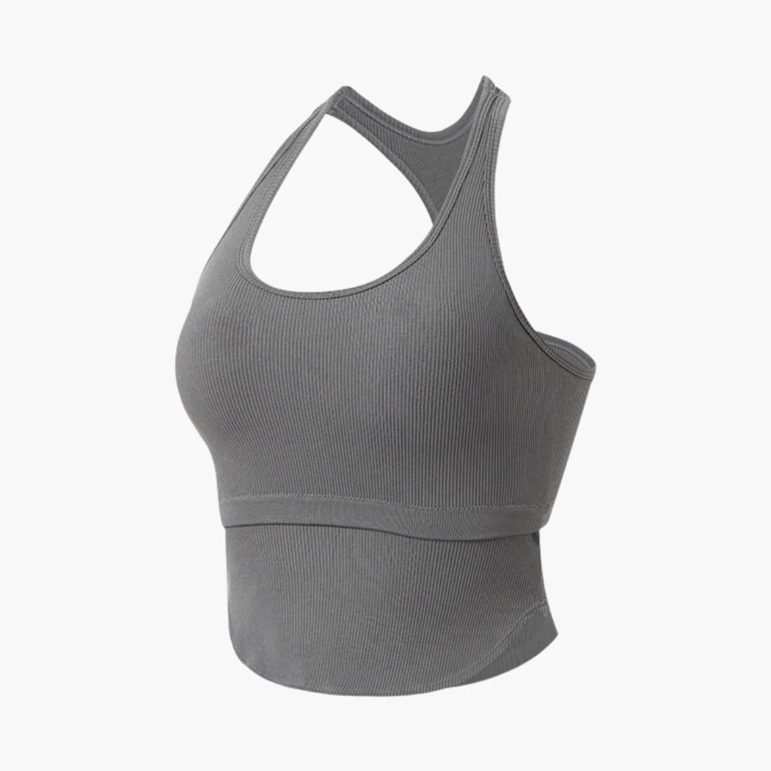 Women's sleeveless fitted sports top, round neckline, streamlined athleisure cut for running and training