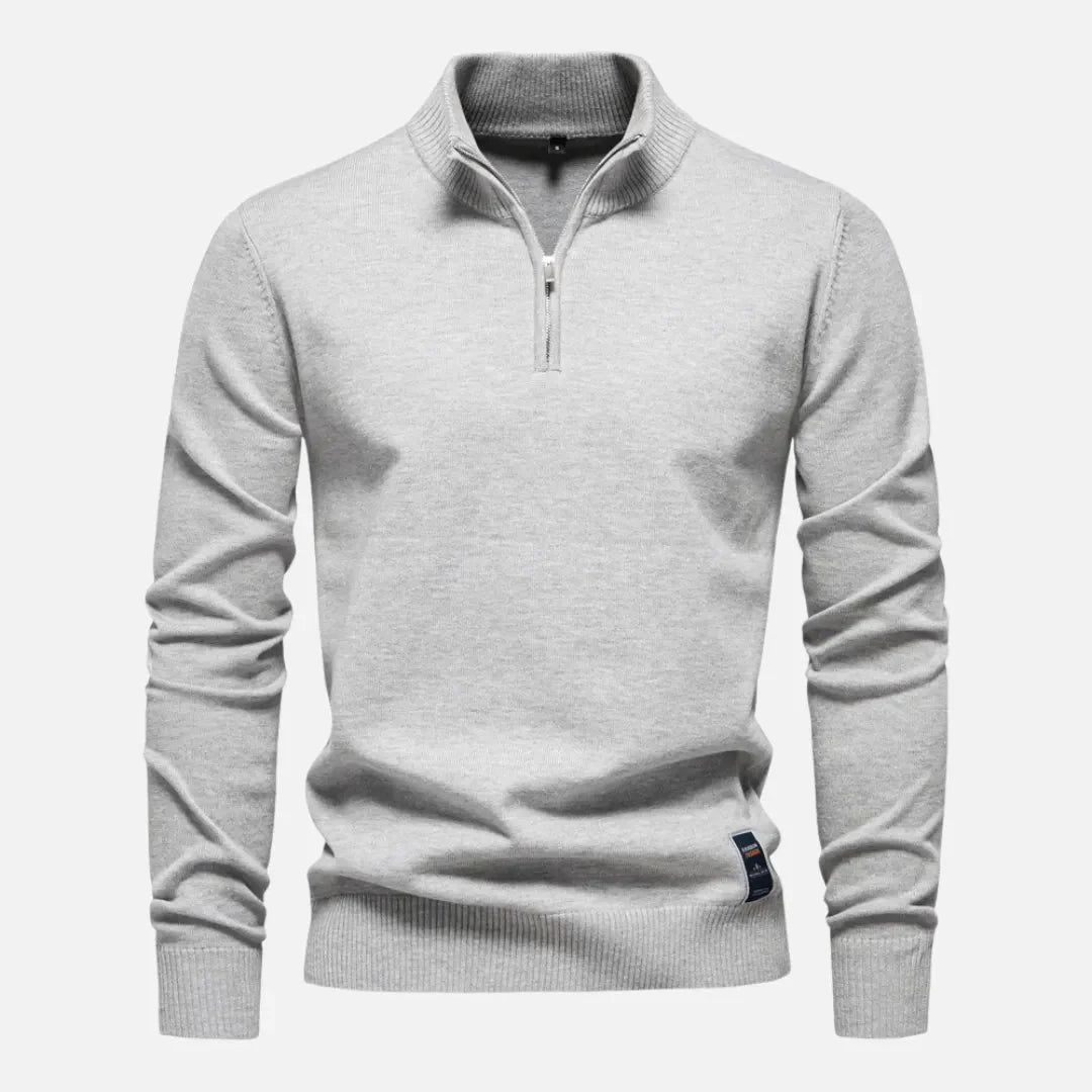 Men's fitted quarter-zip sweater in premium knit with sleek minimalist design and versatile layering collar
