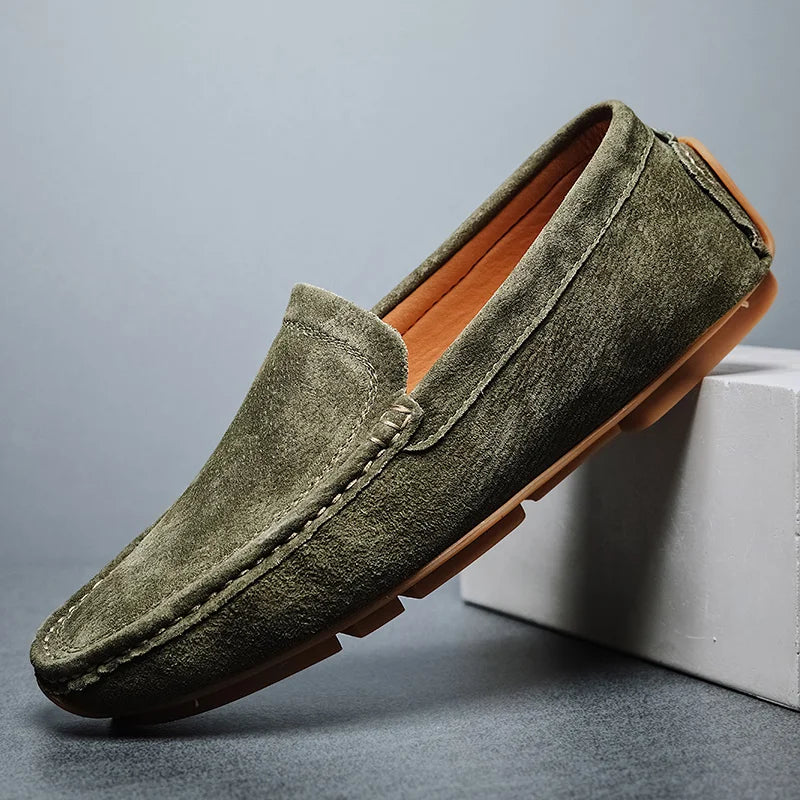 Men's brown genuine leather slip-on loafers with hand-stitched detailing and lightweight comfort sole