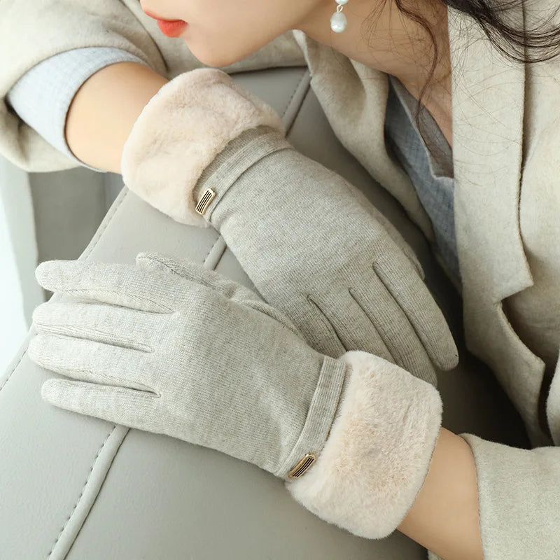 Women's black fitted wrist-length gloves with faux fur cuff and strap detail for winter