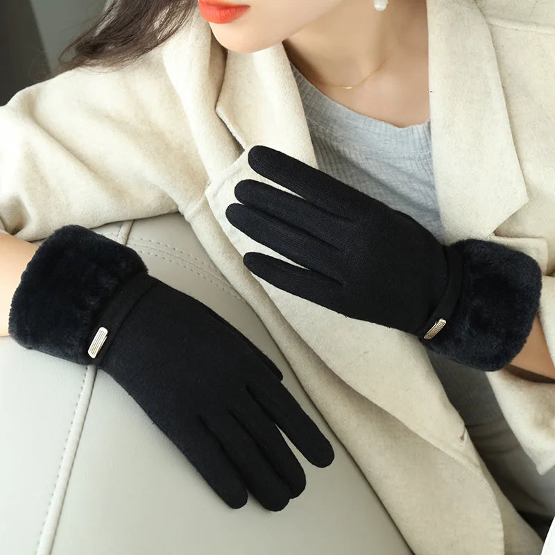 Women's black fitted wrist-length gloves with faux fur cuff and strap detail for winter