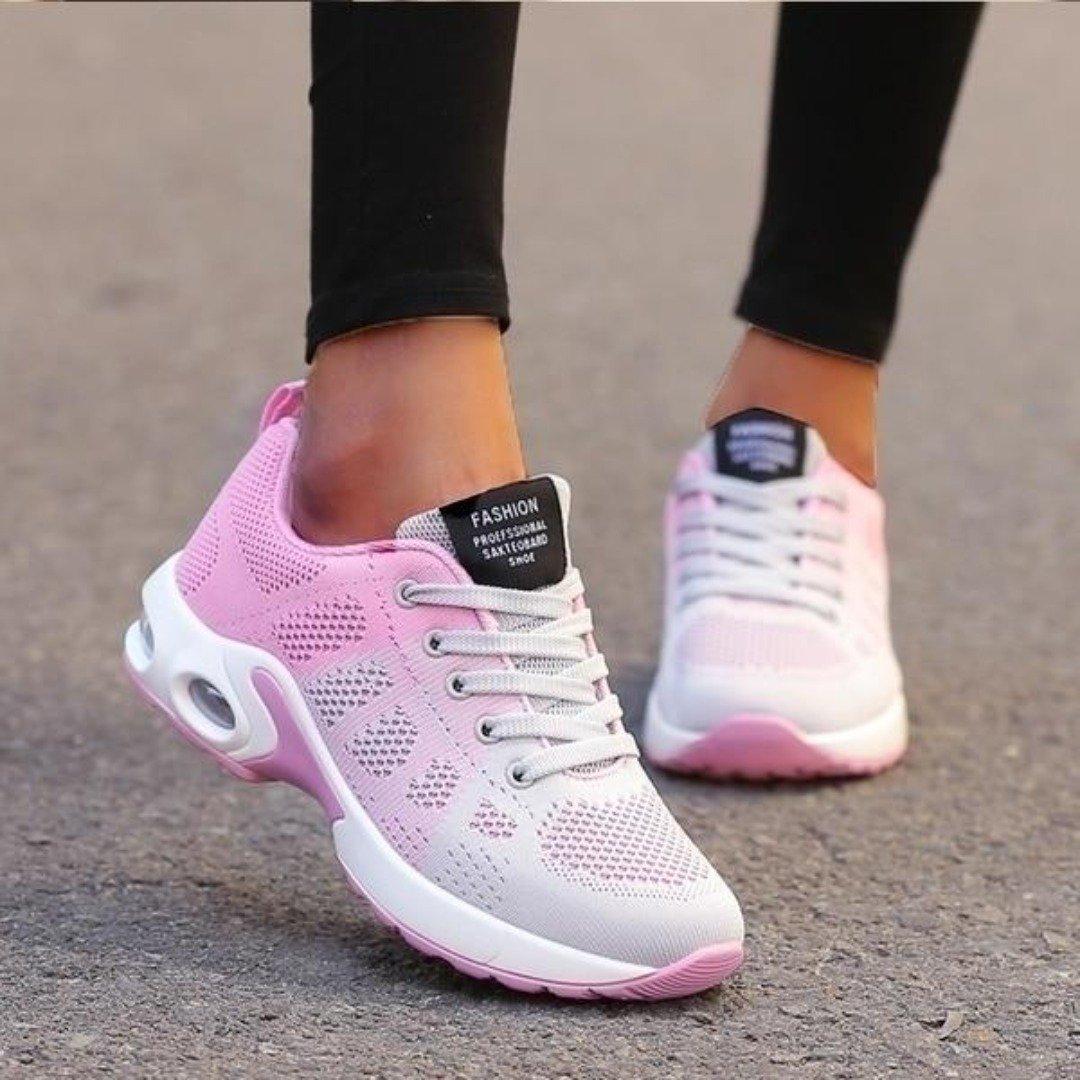 Women's athletic running shoes lightweight sporty design bold accents comfort performance everyday wear