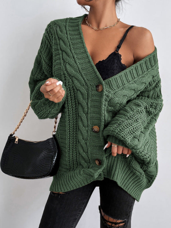 Women's oversized cable knit cardigan in cozy chunky knit with dropped shoulders and relaxed fit
