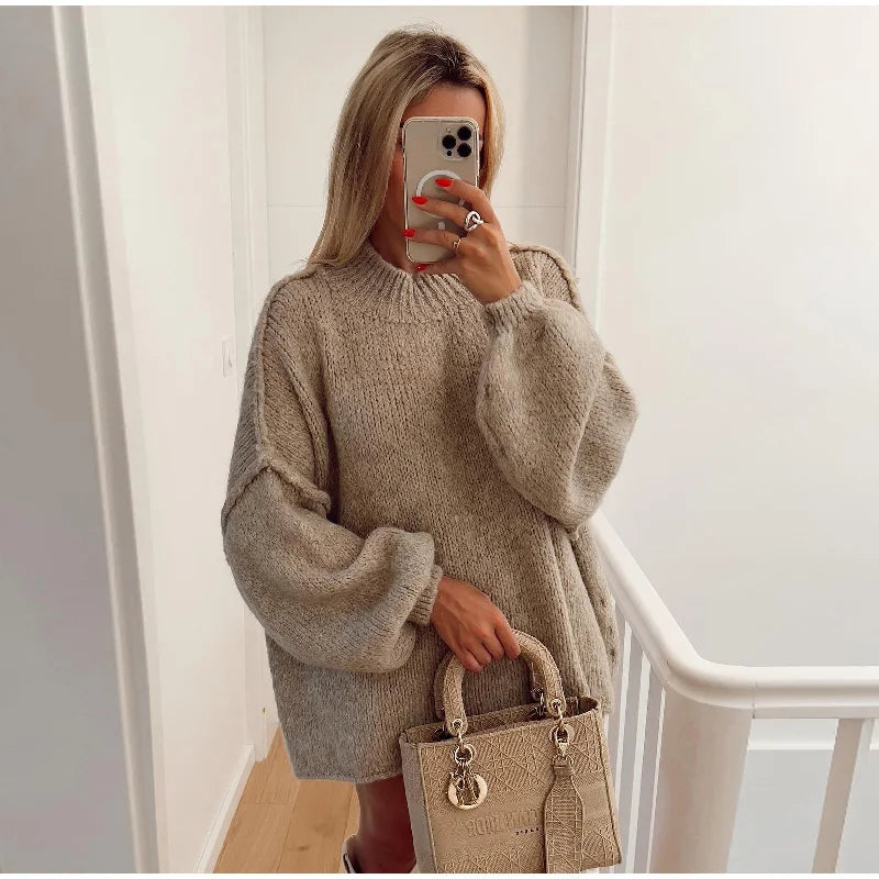 Black oversized fluffy knit sweater with voluminous sleeves, cozy soft texture for effortless chic layering