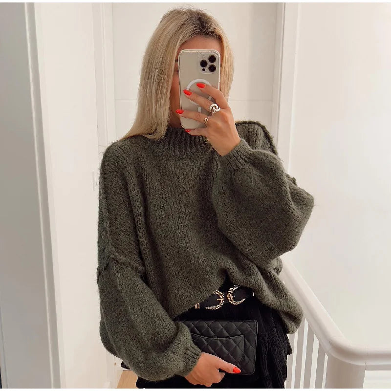 Black oversized fluffy knit sweater with voluminous sleeves, cozy soft texture for effortless chic layering