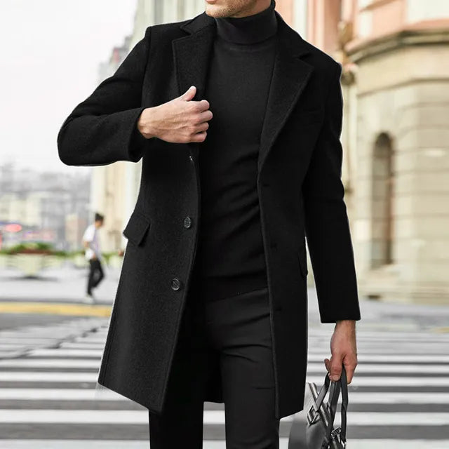 Men's dark tailored winter office coat with streamlined silhouette and refined professional fit