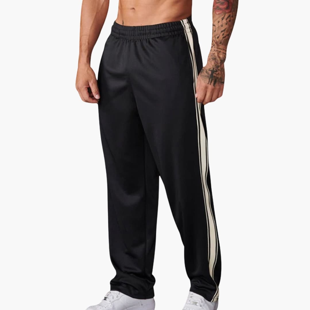 Men's black training pants with side stripes, straight-cut elastic waistband for active athletes