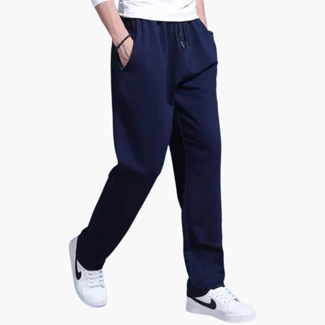Men's gray jogger pants with elastic waistband, drawstring closure, and functional side pockets