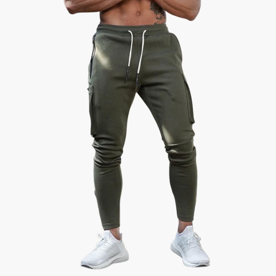 Men's tapered jogger pants with cargo pockets and ankle zippers in a modern athletic fit