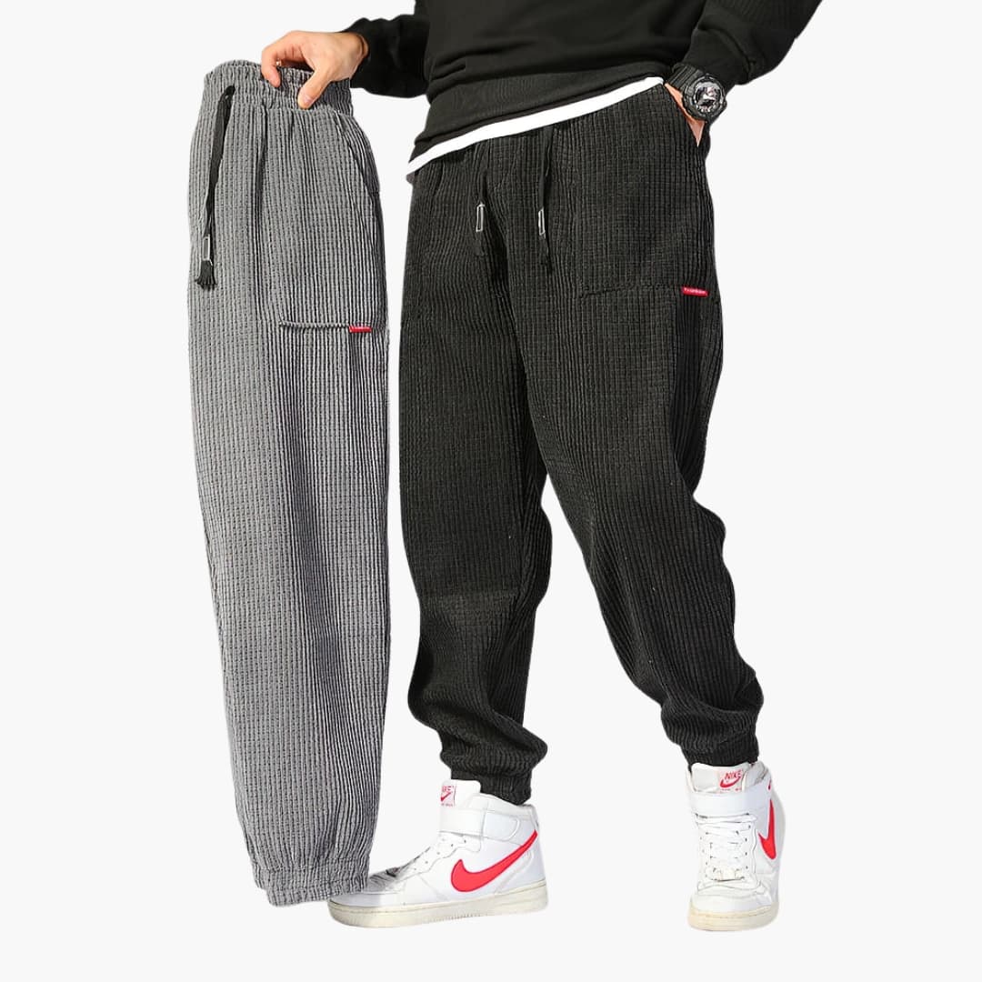Men's brown corduroy jogger pants with elastic drawstring waist and ribbed cuffs casual fit