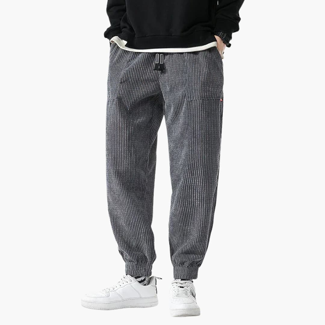 Men's brown corduroy jogger pants with drawstring elastic waist and ribbed cuffs casual fit