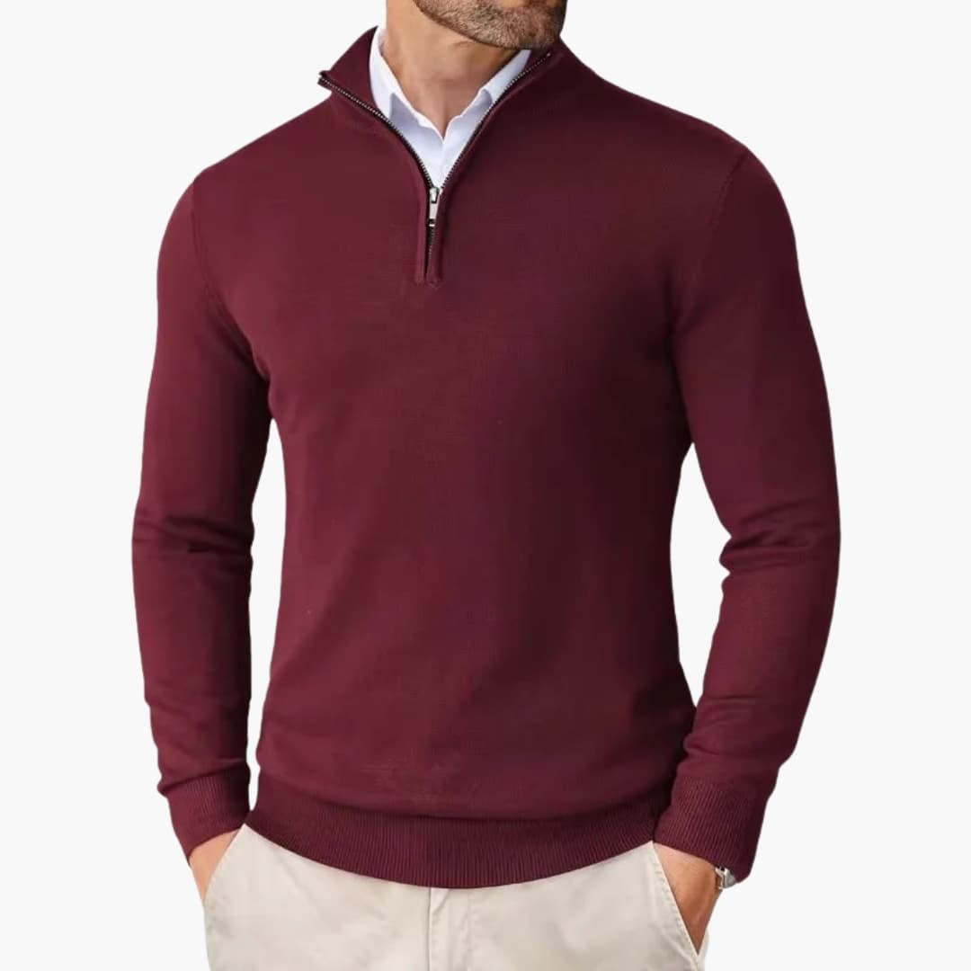 Men's gray knit half-zip sweater with stand-up collar, ribbed cuffs, and metal zipper accent