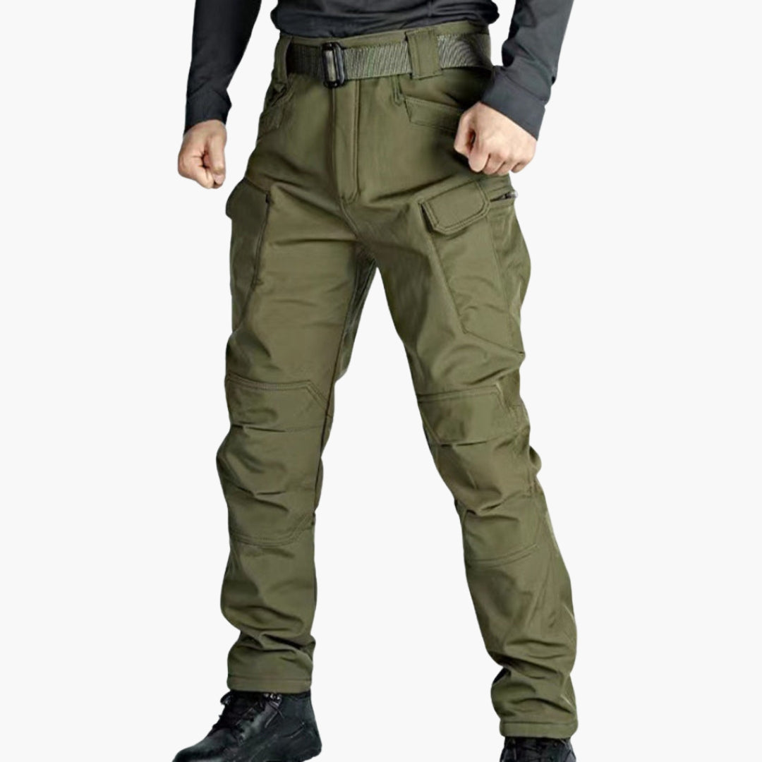 Men's gray hiking pants with reinforced knees, relaxed fit, and multiple utility pockets for outdoor use