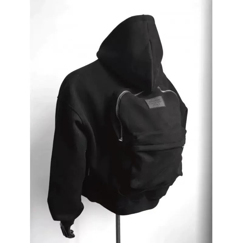 Men's gray hoodie sweatshirt with integrated backpack design, casual fit for travel and everyday wear