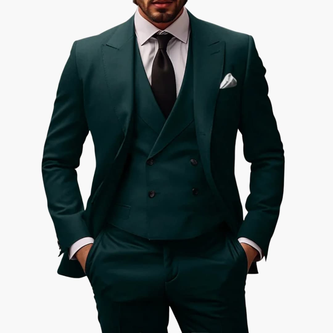 Men's charcoal three-piece structured suit with rising lapel jacket, matching vest, and flat-front trousers