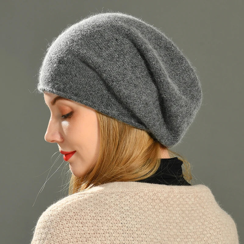 Women's wool-blend slouchy beanie in neutral tone, relaxed knit fit with clean finish detail