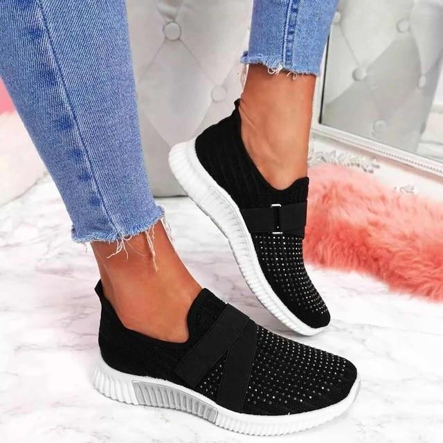 Women white orthopedic slip-on sneakers with Velcro closure, supportive cushioned sole for all-day comfort