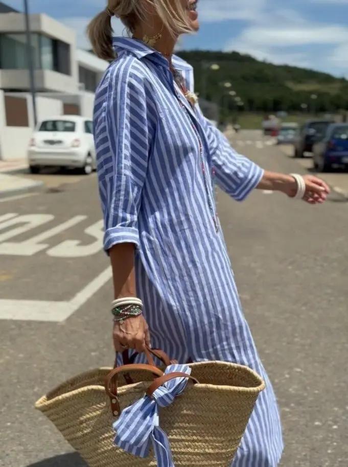Women's striped shirt dress with high-low hem and button-front closure for effortless everyday style
