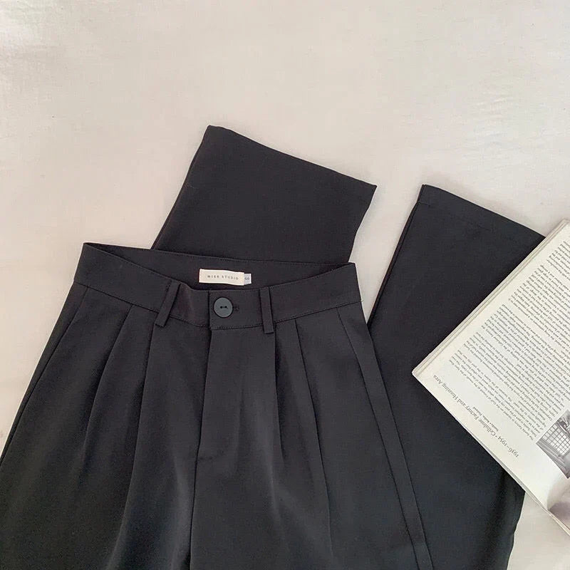 High-waisted women's loose fit office suit pants with flattering waist-accentuating silhouette for workwear