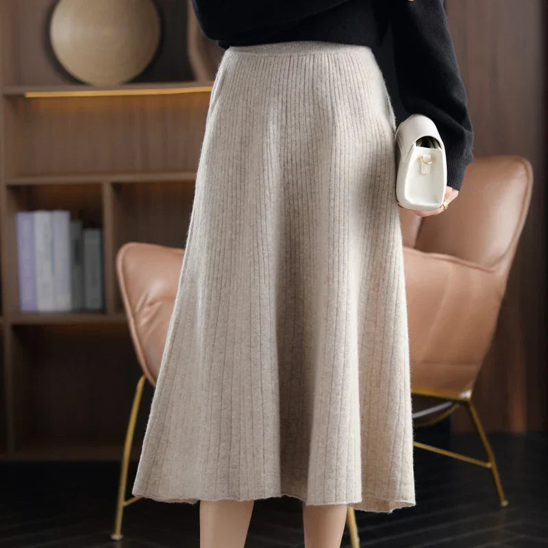 Women's high-waisted wool pleated skirt elegant autumn silhouette with deep pleats for movement