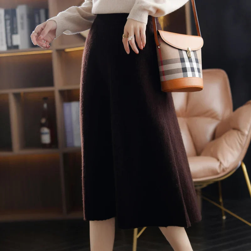 Women's high-waisted wool pleated skirt elegant autumn silhouette with flattering pleated design