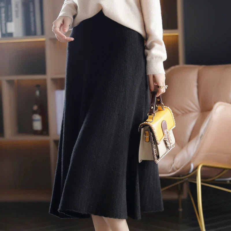 Women's high-waisted wool pleated skirt elegant autumn silhouette with tailored pleats for office wear