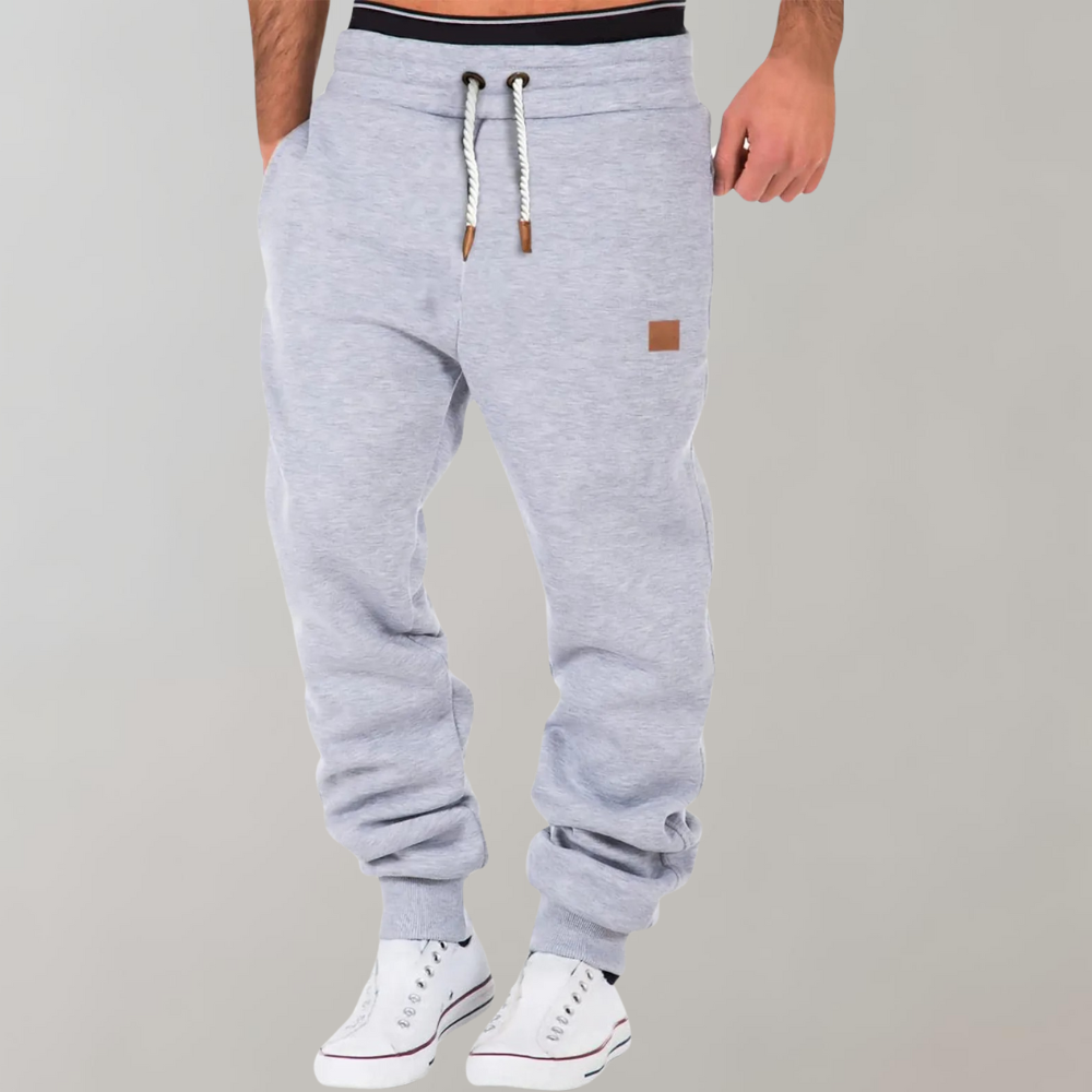 Men's relaxed fit cotton drawstring trousers with ribbed cuffs in casual leisure style