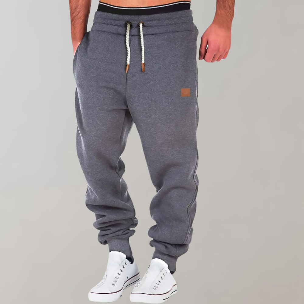 Men's relaxed fit cotton drawstring trousers with ribbed cuffs in casual leisure style