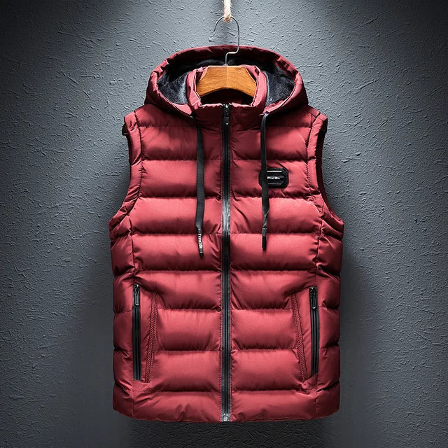 Men's black quilted puffer vest with hooded stand collar and front zipper for versatile layering