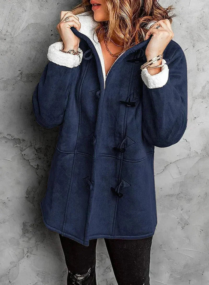 Women's black faux suede toggle coat with shearling lining and hood for winter warmth