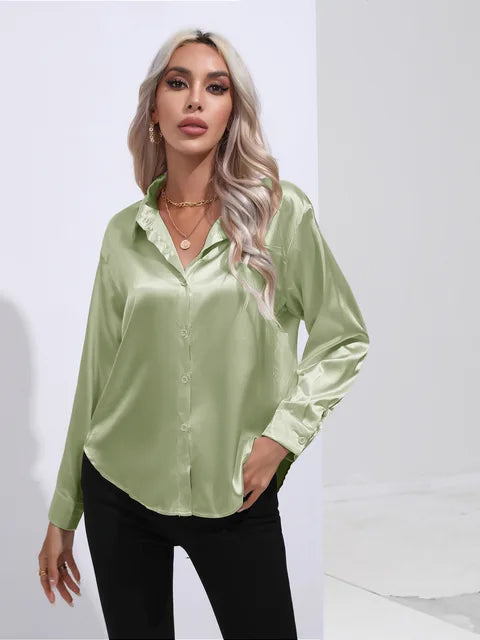 Women's loose satin blouse in polished finish, flowing silhouette with subtle sheen for work or evening