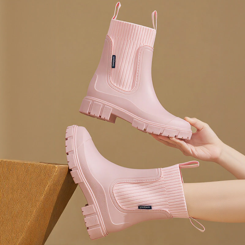 Women's black waterproof Chelsea ankle rain boots with arch support and elastic side panels