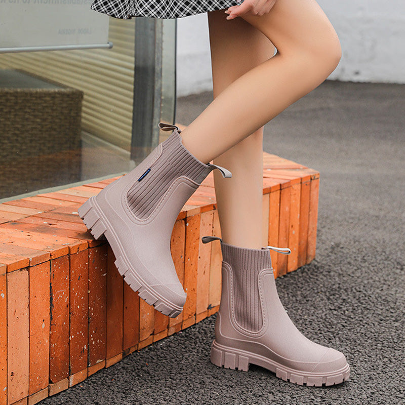 Women's black waterproof Chelsea ankle rain boots with arch support for all-weather wear