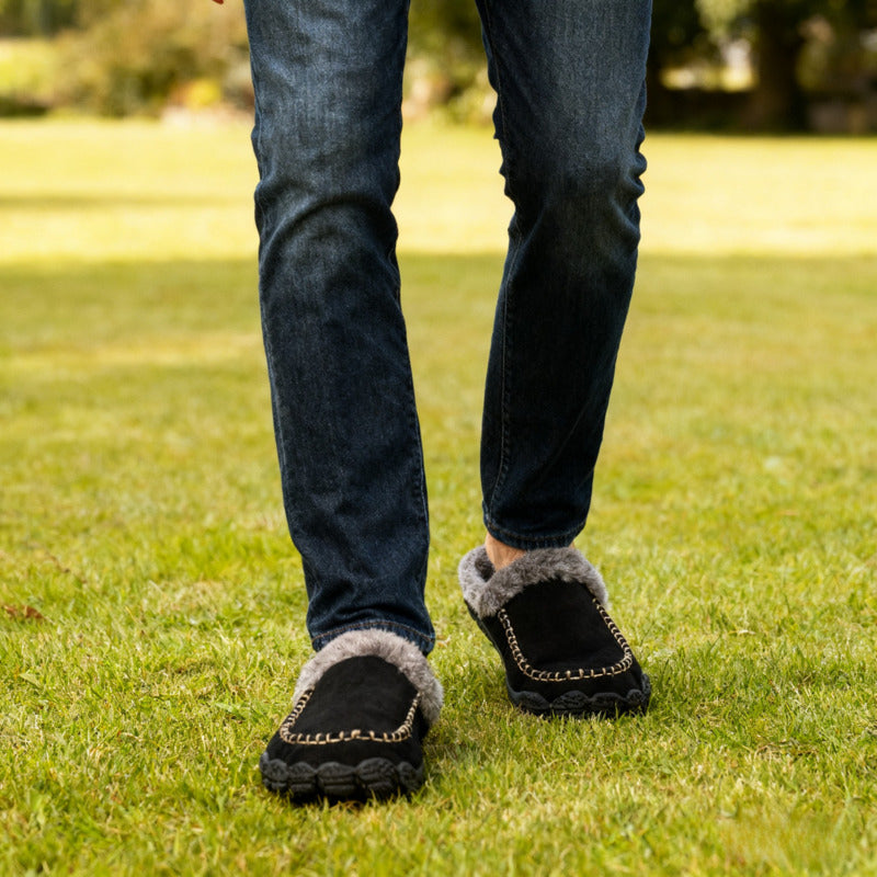 Unisex memory foam mule slippers with plush fleece lining, arch support, and wide toe box